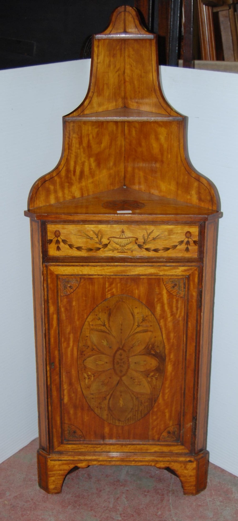 19th century inlaid satinwood corner cabinet, inlaid with urns and foliage, 90cm high and 53cm wide.