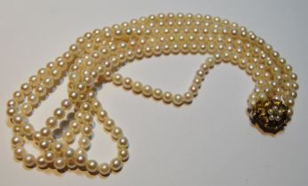 Cultured pearl three-row necklet, on 9ct gold snap.