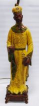 Chinese Shiwan-inspired glazed terracotta table lamp modelled as a Daoist sage wearing a yellow