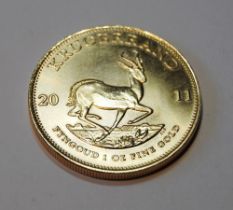 South African Krugerrand, 2011, 1oz fine gold coin, 34g.