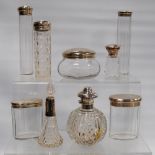Nine silver-mounted glass toilet items. (9)