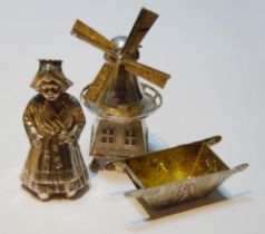 Dutch silver pepperette modelled as a woman in typical dress, B Muller, a salt sled, embossed,