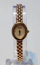 Lady's Rotary 9ct gold bracelet watch with diamond-set bezel, 17.9g gross.