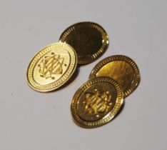 Pair of 18ct gold cufflinks, oval, monogrammed, 8.9g.