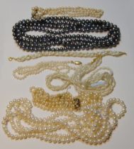 Cultured pearl two-strand necklace and similar items, some with gold beads.