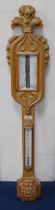 Antique carved oak stick barometer with Prince of Wales feathers surmount above acanthus