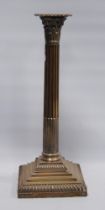 Silver table candlestick with fluted column and Corinthian openwork capital, 1885, loaded, 32cm.