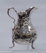 Silver embossed cream jug of Georgian style, 1849, 166g.