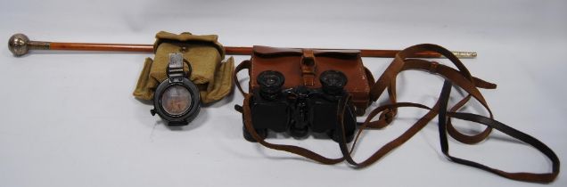 Militaria interest: WWII period liquid pocket field compass contained in a black metal case, with