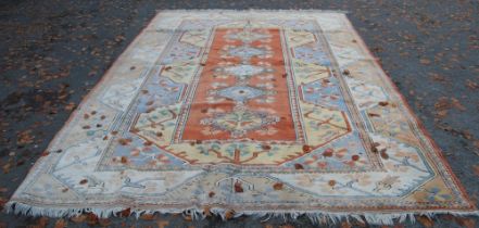 Turkish Milas hand-knotted carpet with five geometric guls to the centre flanked by further