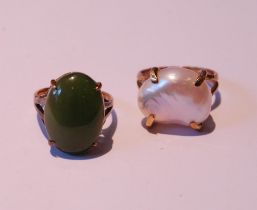 Gold ring with oval nephrite cabochon, '14k', and another with baroque pearl, 9ct, sizes L½ and M,