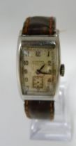 Longines tank-style gent's wristwatch, c. 1940s, in stainless steel case with Arabic numerals,