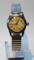Rolex Oyster wristwatch, c. 1930s, in stainless steel case with oatmeal dial, Arabic numerals and