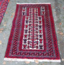 Afghan Belouch hand-knotted rug with all-over geometric guls and motifs on red, blue and cream