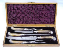 Four-piece carving set with horn handles, with steel, in oak inlaid case.