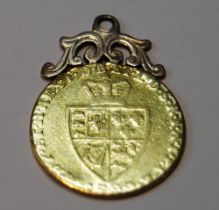 George III gold guinea, 1790, with spade shield home nations crest to the reverse, pendant loop