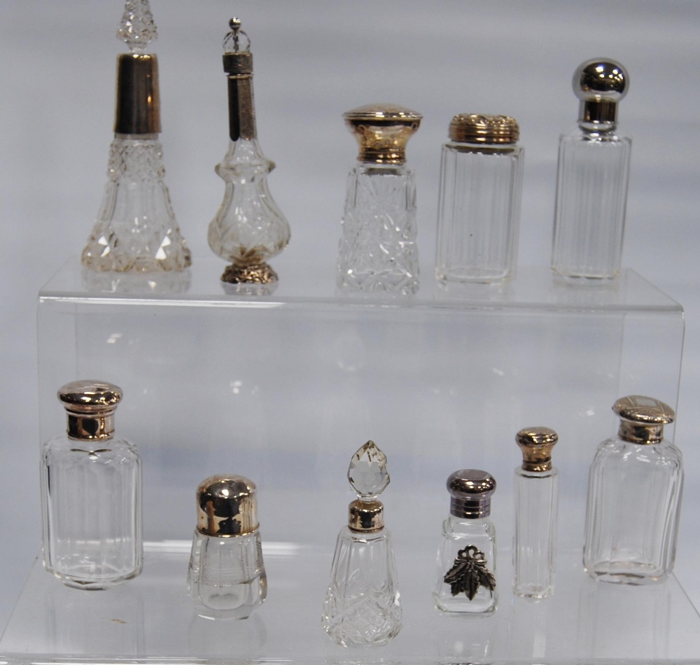 Eleven similar items of silver mounted glass.