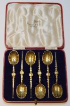 Set of six silver gilt copies of the Anointing Spoon, 1915, cased.
