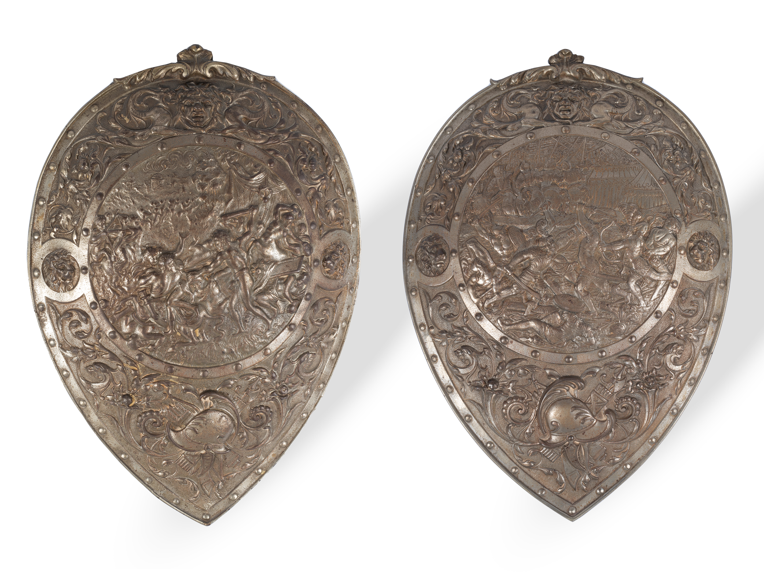 2 escutcheons, Kentauromachy & Battle Scene, Following an example of the 16th century