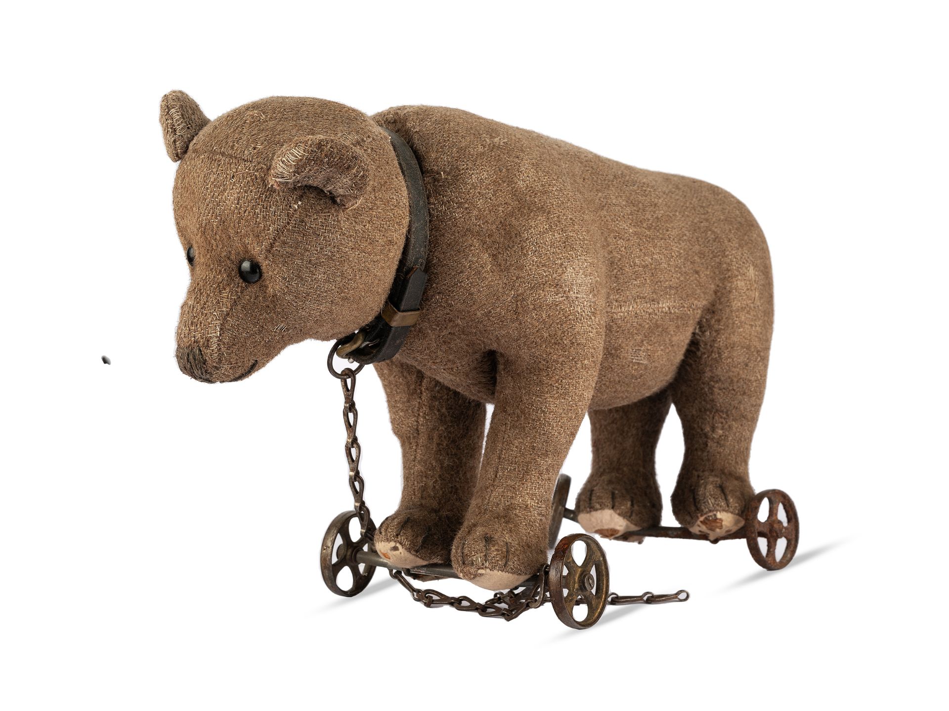 Toy bear on wheels, Around 1910, Fabric & cast iron castors