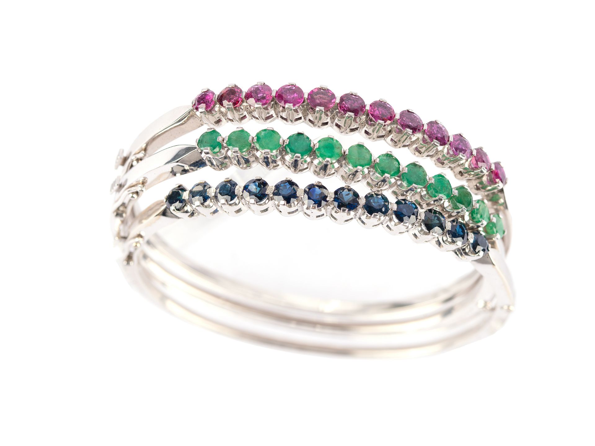 Mixed lot: 3 bangles, 14kt white gold marked, 12 sapphires, emeralds and rubies each?