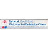 Network SouthEast STATION SIGN 'Welcome to Wimbledon Chase' on the former SR Sutton Loop line now