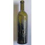 Great Western Railway (GWR) dark green-glass BOTTLE marked 'GWR. Return to Paddington. 02'. From the