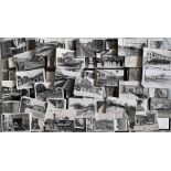 Very large quantity (est. 2,000+) of b&w, postcard-size PHOTOGRAPHS taken by the late Alan A