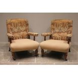 A pair of Victorian lounge armchairs in the manner of Howard & Sons, partially covered in Liberty-