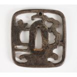 A Japanese Tsuba, Edo Period (1603-1868), Kaku-gata, with pierced Ji designed as waves and a duck,