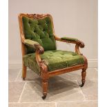 A Victorian satin birch and upholstered open armchair, the top rail centred with a carved leaf swept