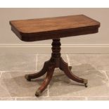 A George IV mahogany pedestal tea table, the hinged and rounded rectangular top raised upon a ring