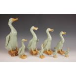 A set of eight Chinese porcelain celadon glazed ducks, 20th century, each of graduated size, largest