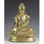 A South East Asian bronze model of buddha, 19th/20th century, seated in dhyanasana on a plinth