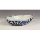 A Chinese porcelain blue and white Narcissus planter, 18th century, of quatrefoil form and