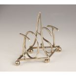 A Victorian silver toast rack in the manner of Christopher Dresser, Hukin & Heath, Birmingham