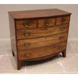 An early 19th century mahogany bowfront chest of drawers, formed from three short and three long