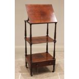A mahogany three tier whatnot with adjustable reading slope, 19th century, the rectangular top