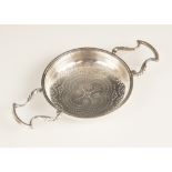 A George II silver lemon strainer, London 1748 (maker's mark worn), the circular bowl with pierced