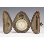 A 19th century compensated pocket barometer by F. Darton & Co, the circular dial contained within