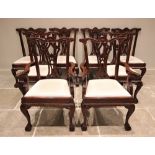 A set of eight mahogany Chippendale style dining chairs, late 20th century, each chair with a