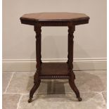 An Edwardian mahogany octagonal top occasional library table, with gadrooned frieze and four