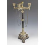 A 19th century polished slate and gilt metal French Empire candelabra, the five cast acanthus