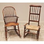 A 19th century style hoop back ash Windsor rocking chair, 20th century, the stick back above a