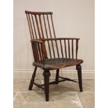 A late 18th/early 19th century primitive ash and elm comb back Windsor chair, probably Thames