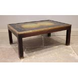 A 20th century oak terrestrial map top coffee table, the verre eglomise glass top, brass bound and