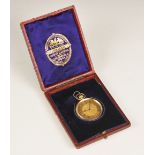 A Victorian 18ct gold open face pocket watch, the circular dial with engine turned decoration and