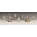 A pair of silver plated three light candelabras, each with shaped square bases and knopped stems