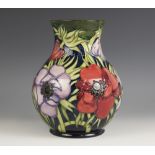 A Moorcroft vase decorated in the Anenome Tribute [to Walter Moorcroft] pattern designed by Emma