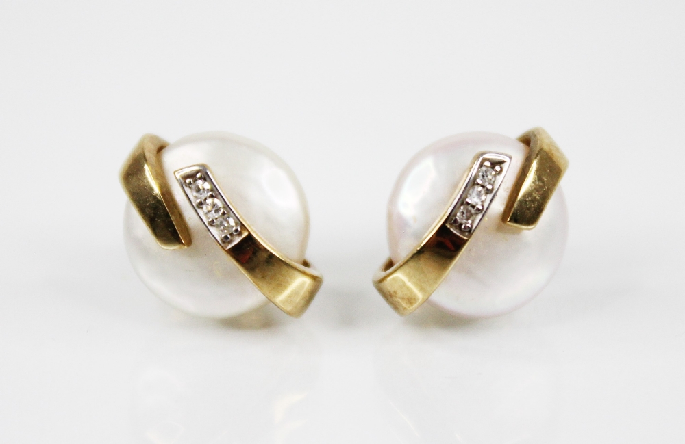 A pair of pearl and diamond 9ct gold earrings, each designed as a button pearl, approximately 10mm